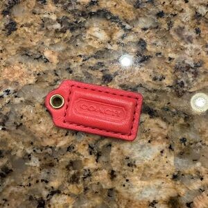 Coach mini tag